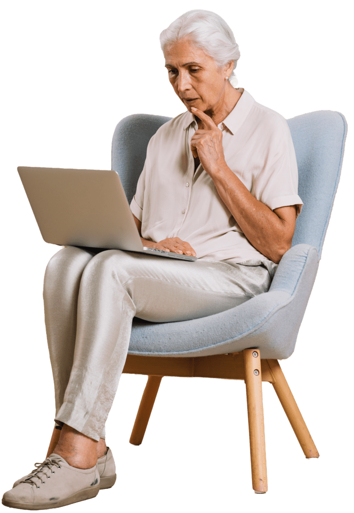 Elderly Woman Sitting with a laptop